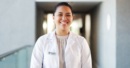 Doctor, healthcare and woman with smile, portrait and cardiology specialist with career ambition in clinic. Female person, employee and surgeon in hospital for wellness, medical service and pride