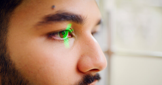 Eye exam, laser and optometry with man in clinic for assessment, consulting or visual correction. Equipment, OCT test and retina scan with client person at appointment for optical mapping or vision