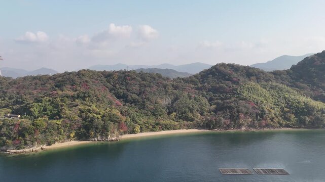 Kanawa Island, Minami Ward, Hiroshima Bay, Japan Coastline: 4K Aerial Drone Footage of Forest Mountains, Rural Island, Autumn Colours, Beaches, Clear Ocean Water, Fish Cage