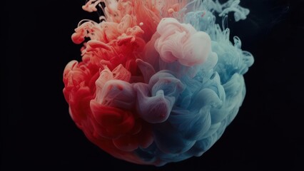 Obraz premium Abstract explosion of vibrant red and blue ink in water.