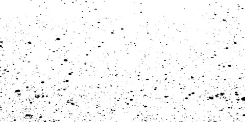 Scattered black speckles on a pure white background creating a grainy texture