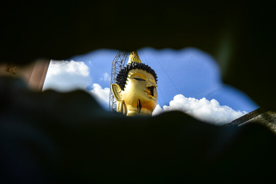 Golden Buddha Statue, Lanna Architecture, Symbols of Buddhism, South East Asia at Wat Phra Phuttha Santiparangon Sri Phingkhonakhon Mongkhon (Phra Chao Ton Luang) Chiang Mai, Northern Thail