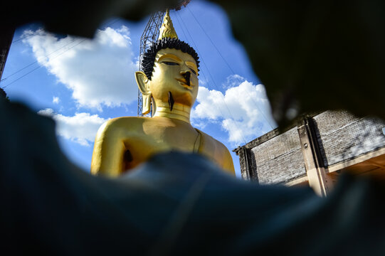 Golden Buddha Statue, Lanna Architecture, Symbols of Buddhism, South East Asia at Wat Phra Phuttha Santiparangon Sri Phingkhonakhon Mongkhon (Phra Chao Ton Luang) Chiang Mai, Northern Thail