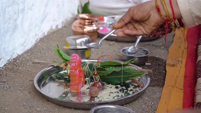 Authentic scene of a traditional Indian marriage vidhi, capturing sacred rituals performed around the holy fire (Agni) under a decorated mandap