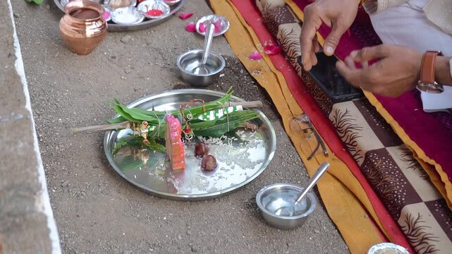 Authentic scene of a traditional Indian marriage vidhi, capturing sacred rituals performed around the holy fire (Agni) under a decorated mandap