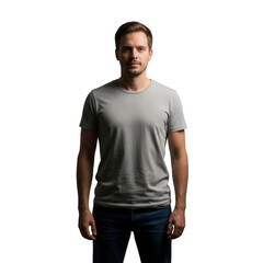 Young Adult Man in Grey T-Shirt and Jeans Standing Against Black Background