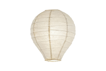 Illuminating round paper lantern suspended against a void