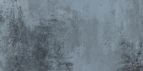 Gray grunge concrete wall texture background with weathered distressed surface with subtle variations in tone.