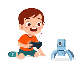 Happy excited boy sitting controlling blue robot toy with remote control joyful child playing tech gadget