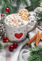 Reindeer mug with hot chocolate and gingerbread cookie