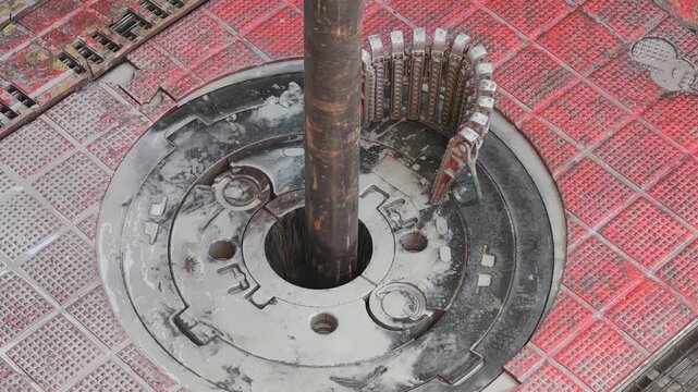 Running casing into the oil well on the drilling rig. This is one of drilling rig operation.
