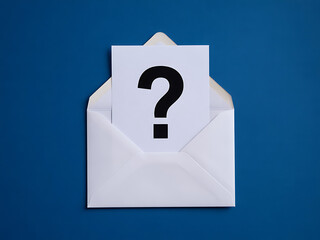 A mysterious question mark card being pulled out of a white envelope on a solid blue backdrop