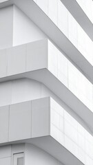 Obraz premium Sleek, modern architectural design featuring clean lines and a minimalist aesthetic on a white building facade.