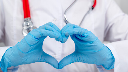 Doctor or doctor in a white coat with a stethoscope