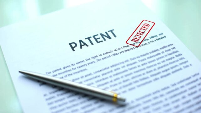Patent document rejected, hand stamping seal on official paper, copyright law.