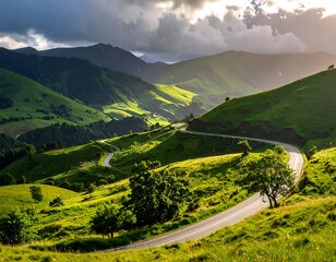 Winding road through sun-drenched, rolling hills under a dramatic sky. Sunlight streams through clouds, illuminating the vibrant green landscape