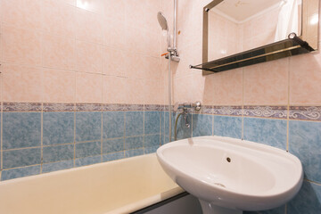 modern bathroom room with toilet and washing machine