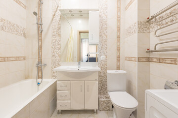 modern bathroom room with toilet and washing machine