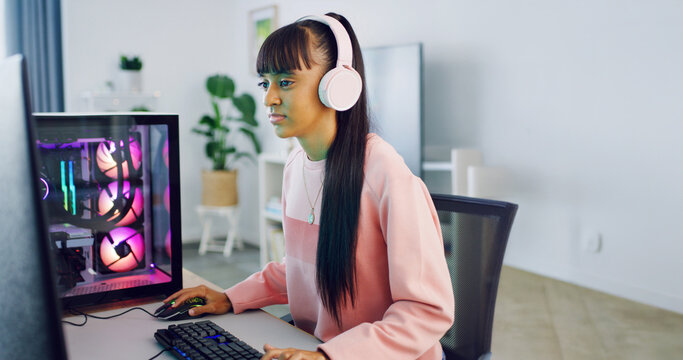 Woman, gaming and computer with technology for streamer, esports and online hobby in home. Headphones, gen z content creator and streaming with video game, tournament or internet challenge for vlog
