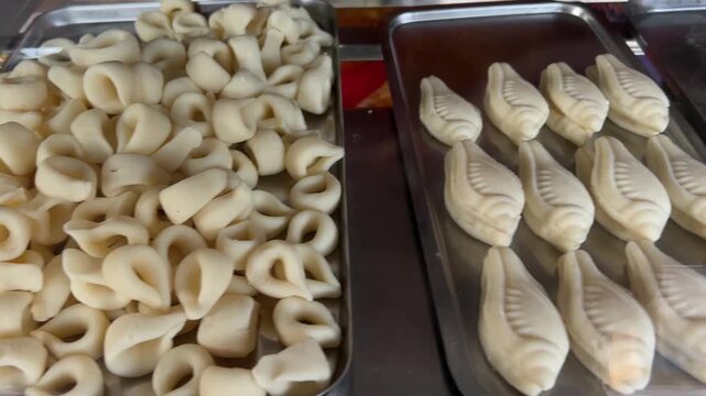 Local Bengali sweets made with milk sold in a village in Bengal, India