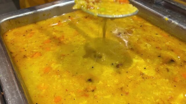 Special dal fry prepared with vegetables in a Bengali style