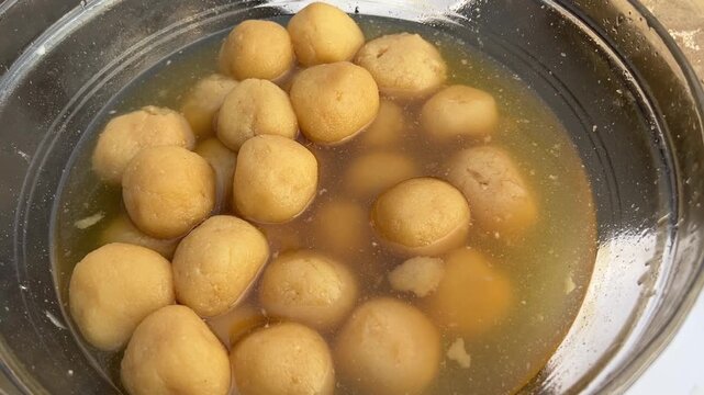 Nolen gurer rosogolla at a Bengali wedding in Kolkata 