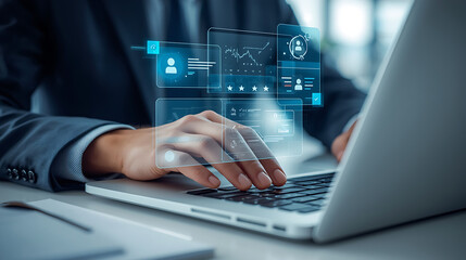 A professional business scene features a person in a suit working on a laptop at a desk, accompanied by futuristic holographic UI elements. Transparent digital panels show five-star rating.