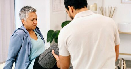 Physiotherapy, leg stretch or woman in clinic for consultation, aid or service in rehabilitation....