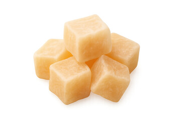 Small pale orange cheese cubes stacked together, bite-sized and creamy