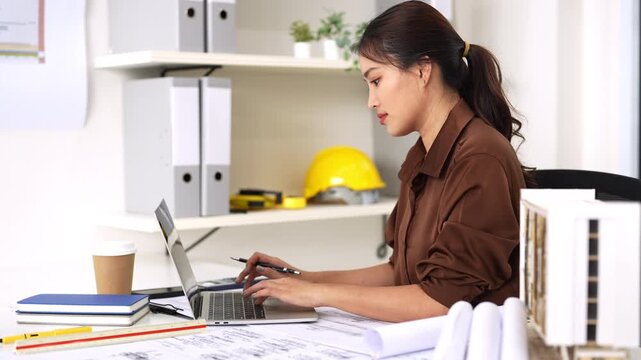 Laptop, architecture or construction engineer in an office for planning a building project.