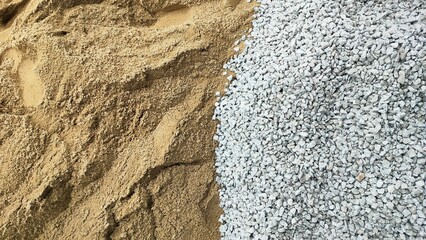 Pile of sand and stones texture to build a house. gravel or stone and sand in construction site. Materials for construction, sand, crushed stone