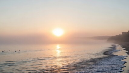 Serene beach scene at sunrise with calm waters
