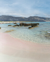 Pink Shoreline and Shallow Waters in Crete, Greece