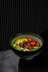 Poke bowl with salmon and vegetables isolated for menu