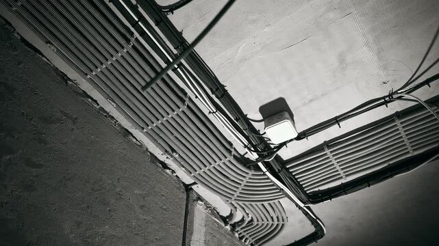 Neat Cable Tray Under Concrete Ceiling Bundled Conduits Junction Box Industrial Lighting Scene