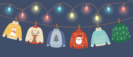 A vector banner of six cartoon Christmas sweaters (polar bear, reindeer, Santa, tree, geometric) hanging from a glowing light garland © Julia G art