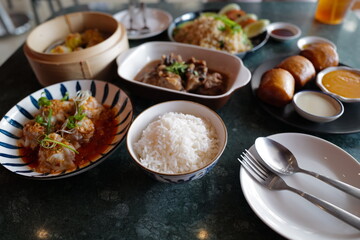 Deep fried bun served with salted egg sauce and sweet condensed milk, stir fry rice, Shumai(Chinese pork dumplings), stew ribs