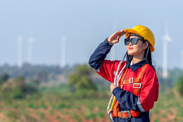 Woman engineer inspection check control wind power machine construction installation in wind energy...