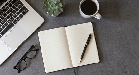 Workspace Setup Laptop, Notebook, Coffee, and Glasses pen
