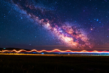 Milky Way Over Long Exposure Light Trails
