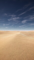 Vast sandy terrain stretches endlessly under a vibrant blue sky adorned with wispy clouds. The scene captures the serenity and solitude of a remote desert setting.