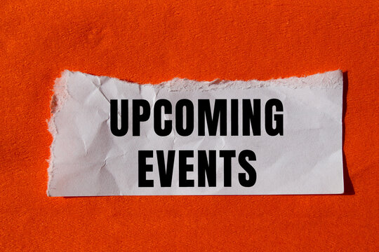 Upcoming events message written on ripped torn paper background. Conceptual Upcoming events symbol. Copy space.