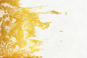 A luxurious background featuring gold patterns on white washi paper