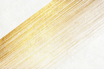 A luxurious background featuring gold patterns on white washi paper