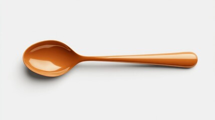 Orange spoon isolated on white background with copy space