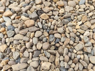 pebble stones on the beach, close up of stone background