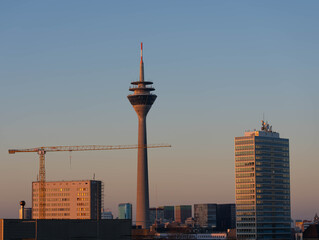 Series of three Pictures of the Rheinturm in Duesseldorf in the Dawn of Day - Different Lightnings. High quality photo