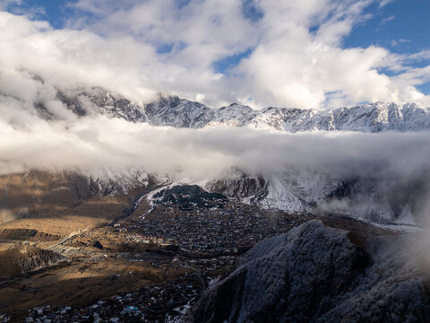 Kazbegi Valley Town Nestled Below Majestic Caucasus Peaks