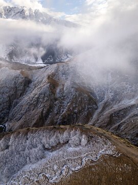 Winter Frost and Fog Over Mountain Village - Kazbegi Mountains