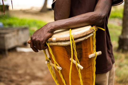 Belizean drum maker with one of his drums